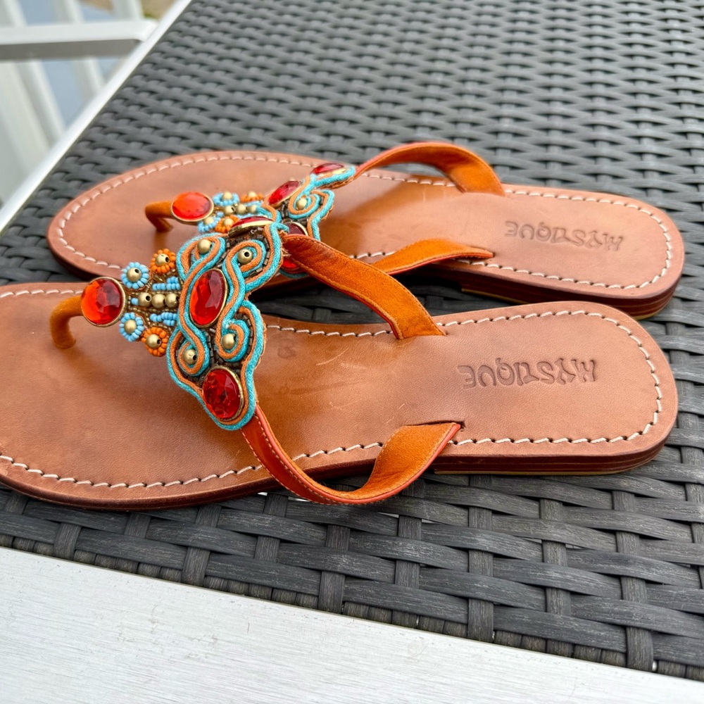Mystique Boutique Orange and Red Sandals with Boho Charm and leather soles